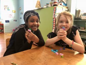 J'Nell and Sarah show off their crafts